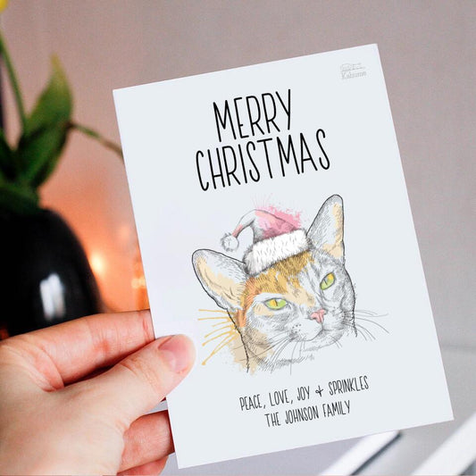 Deine Katze mit Santa-Mütze - Personalisierbare Postkarte